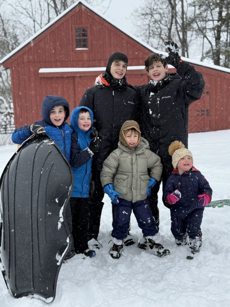 Sled riding in Waterford with all 6 of the grandkids